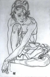 Hockende mit vorgeschobenem linken Arm